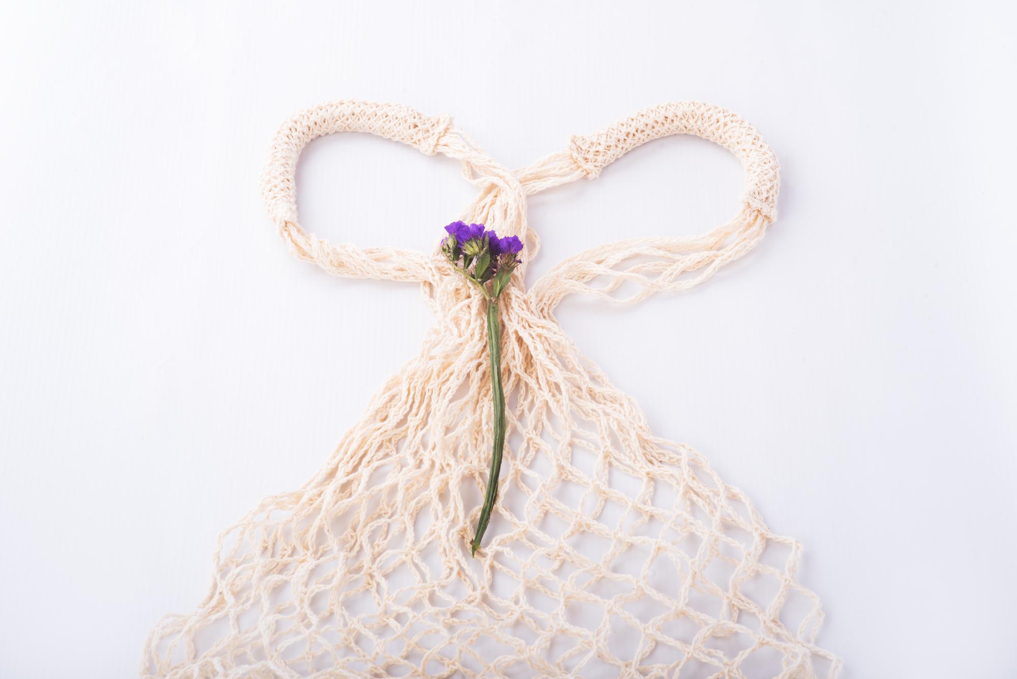 Embroidered linen tote with subtle motif